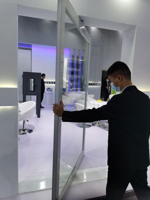 Porte pivotante en aluminium à cadre mince vitrage transparent à température tempérée Porte pivotante d'entrée