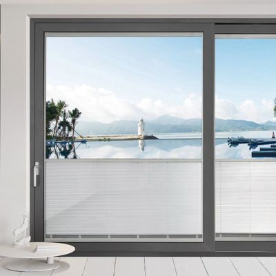 Porte coulissante en aluminium d'appartement ou de résidence avec fonction de prévention de la fumée d'huile de design moderne