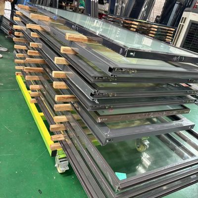 Porte pliante à double vitrage transparent, robuste et isolée thermiquement